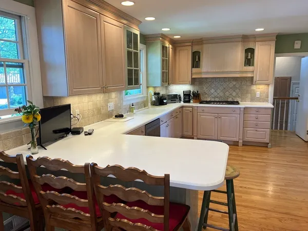 a kitchen with a sink and cabinets