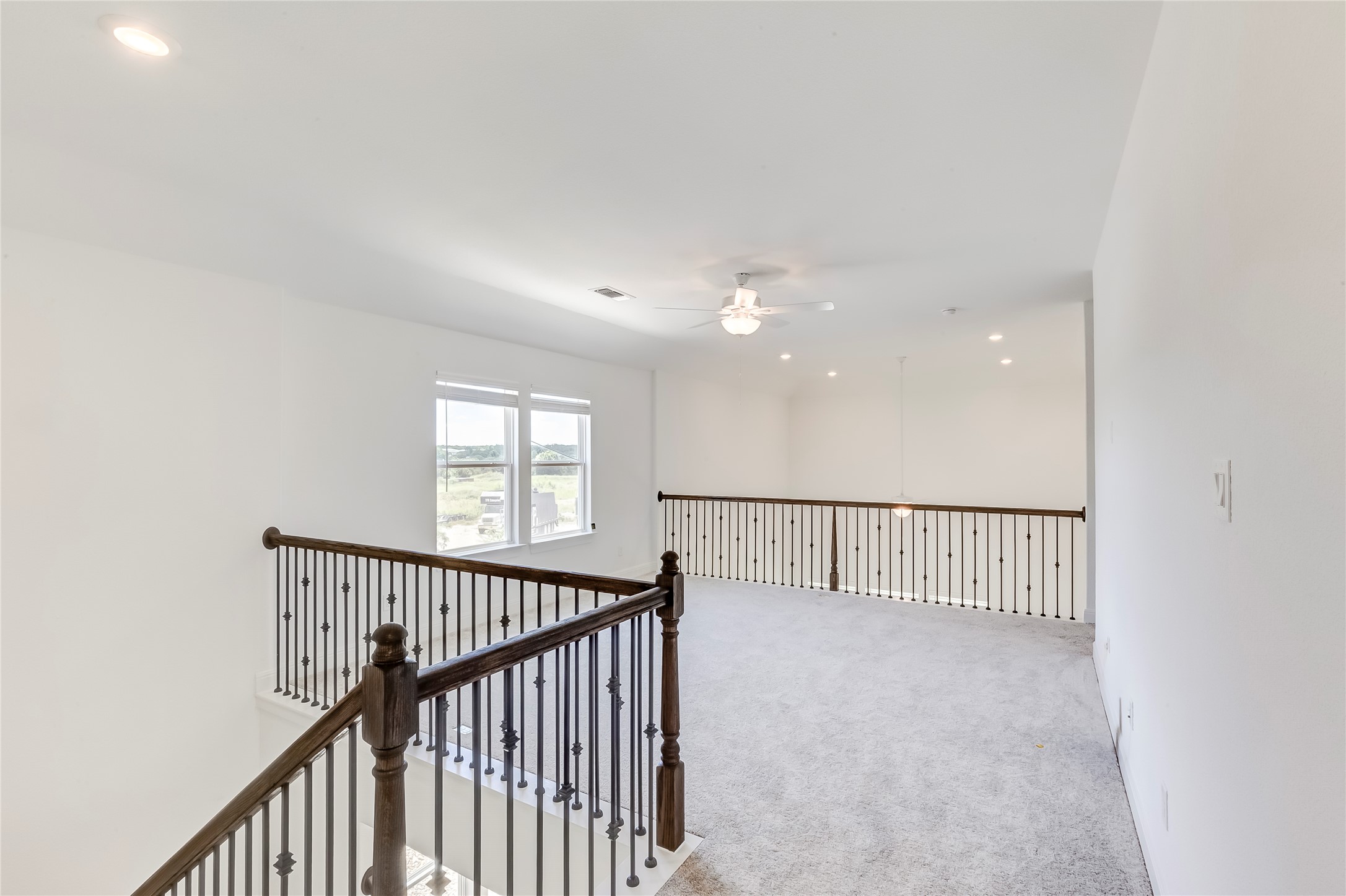 132 Inlet Lane Leander, TX 78641 - Photo 23 of 36 Hall featuring carpet flooring and recessed lighting