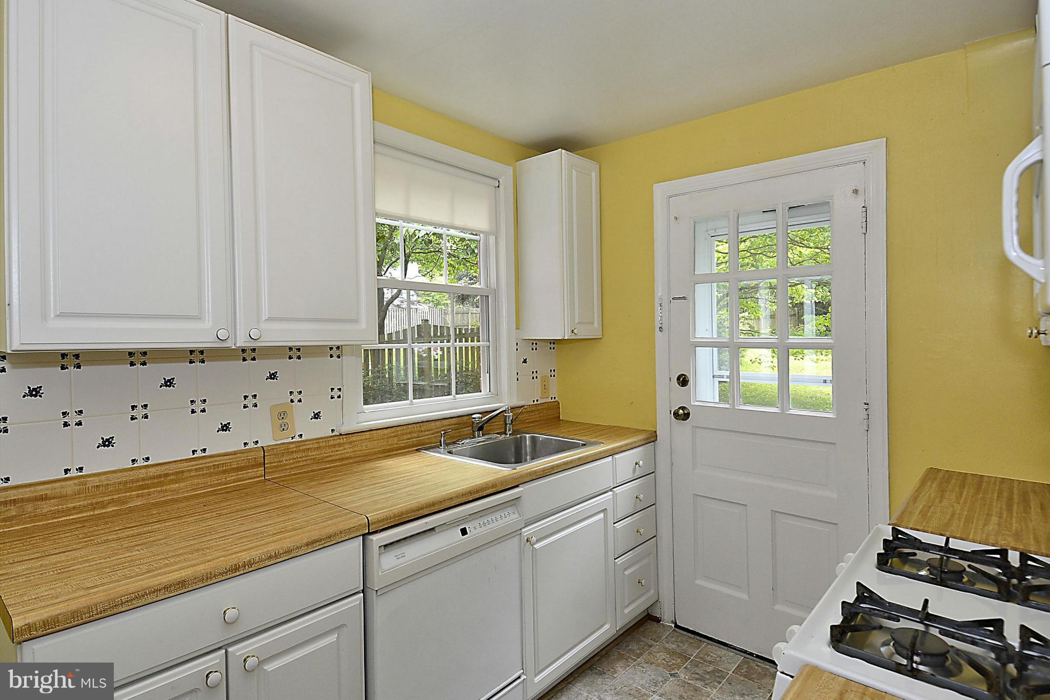 5004 Allan Road Bethesda, MD 20816 - Photo 11 of 30 a kitchen with sink and window