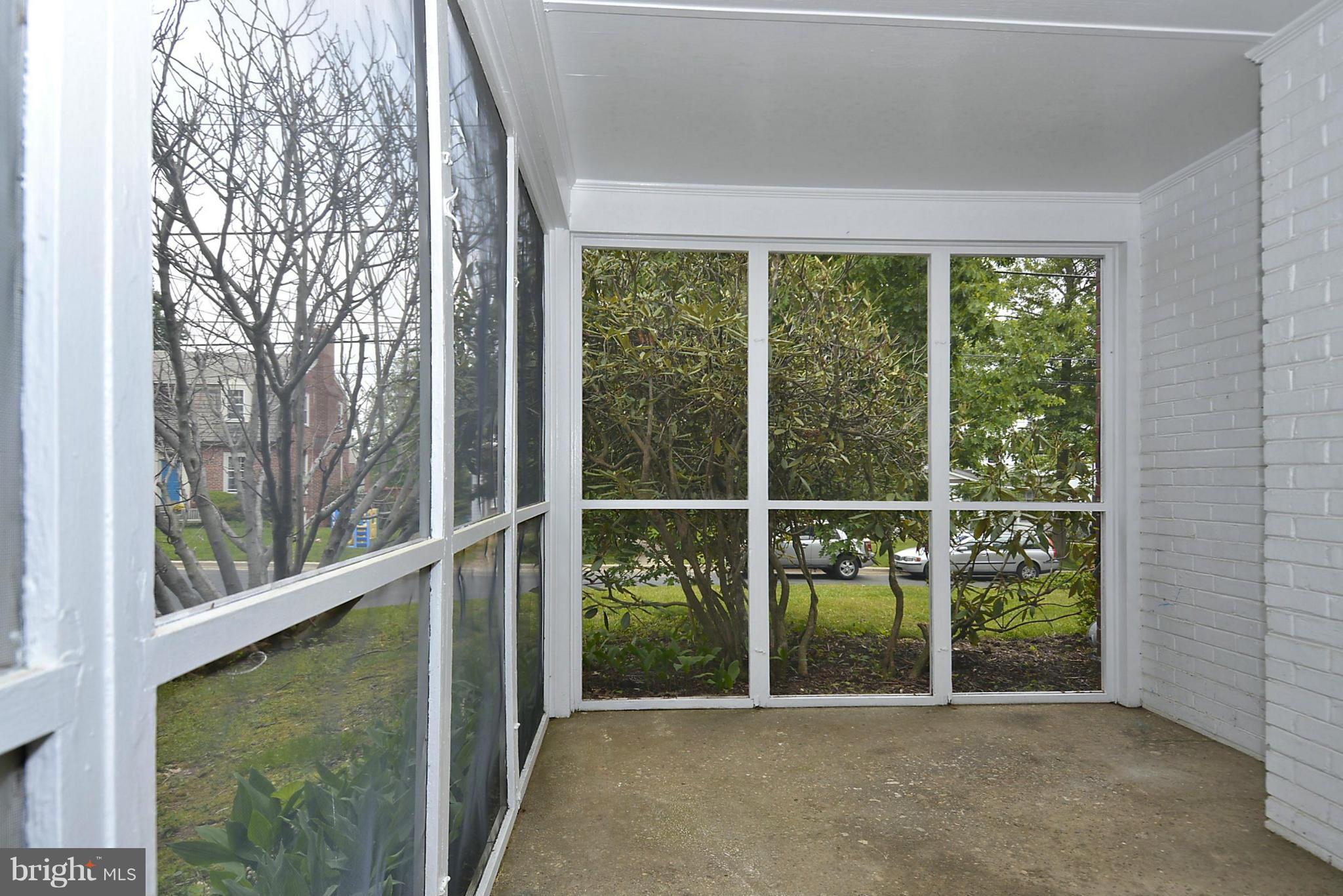 5004 Allan Road Bethesda, MD 20816 - Photo 13 of 30 a view of a room with a large window