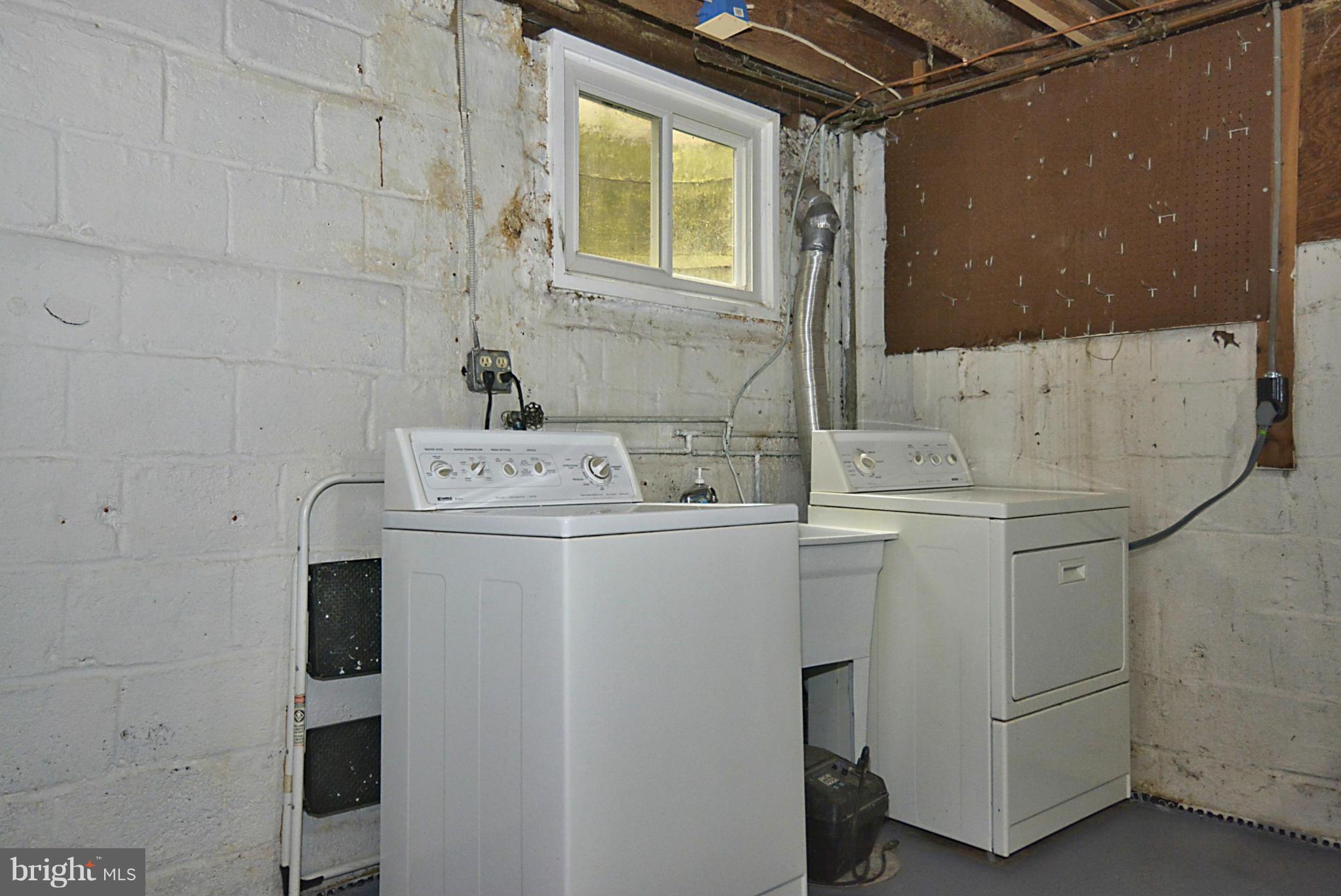 5004 Allan Road Bethesda, MD 20816 - Photo 25 of 30 a utility room with dryer and washer