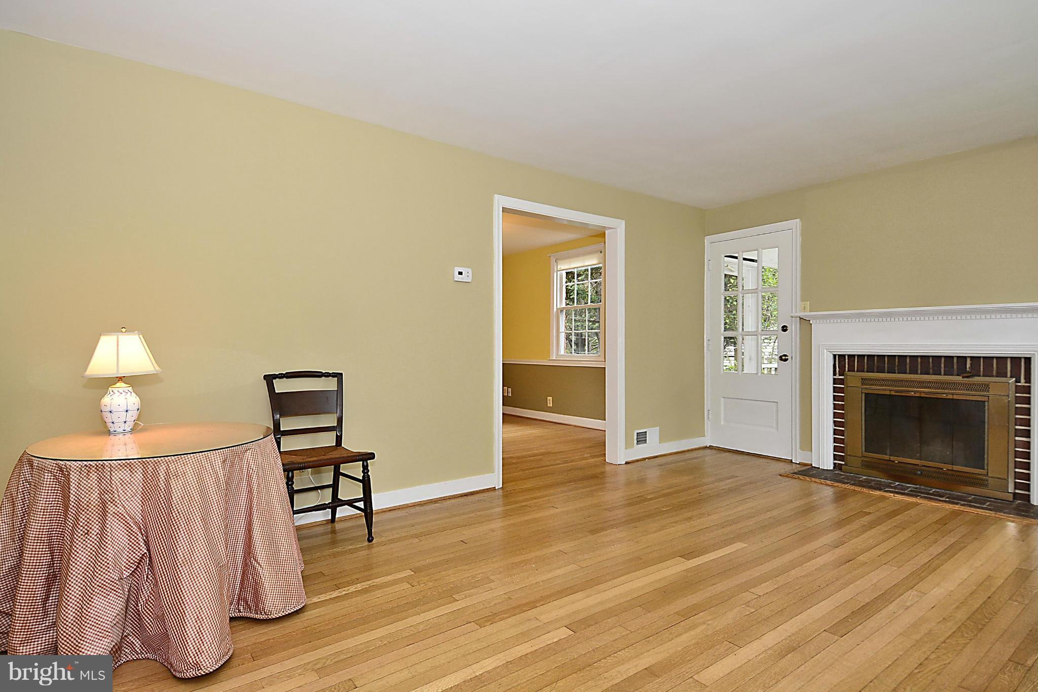5004 Allan Road Bethesda, MD 20816 - Photo 4 of 30 a view of empty room with wooden floor