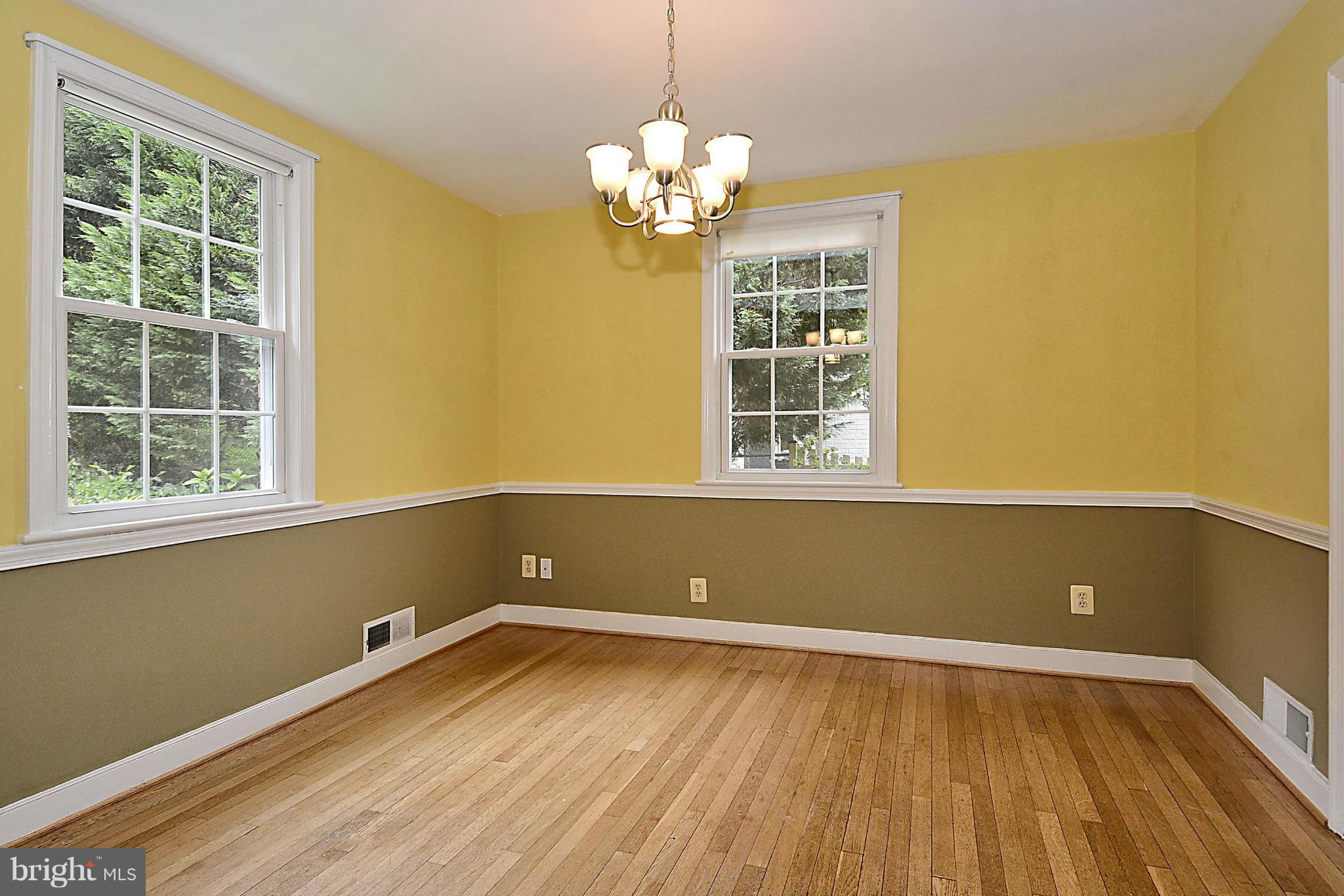 5004 Allan Road Bethesda, MD 20816 - Photo 7 of 30 a view of a room with wooden floor and a window