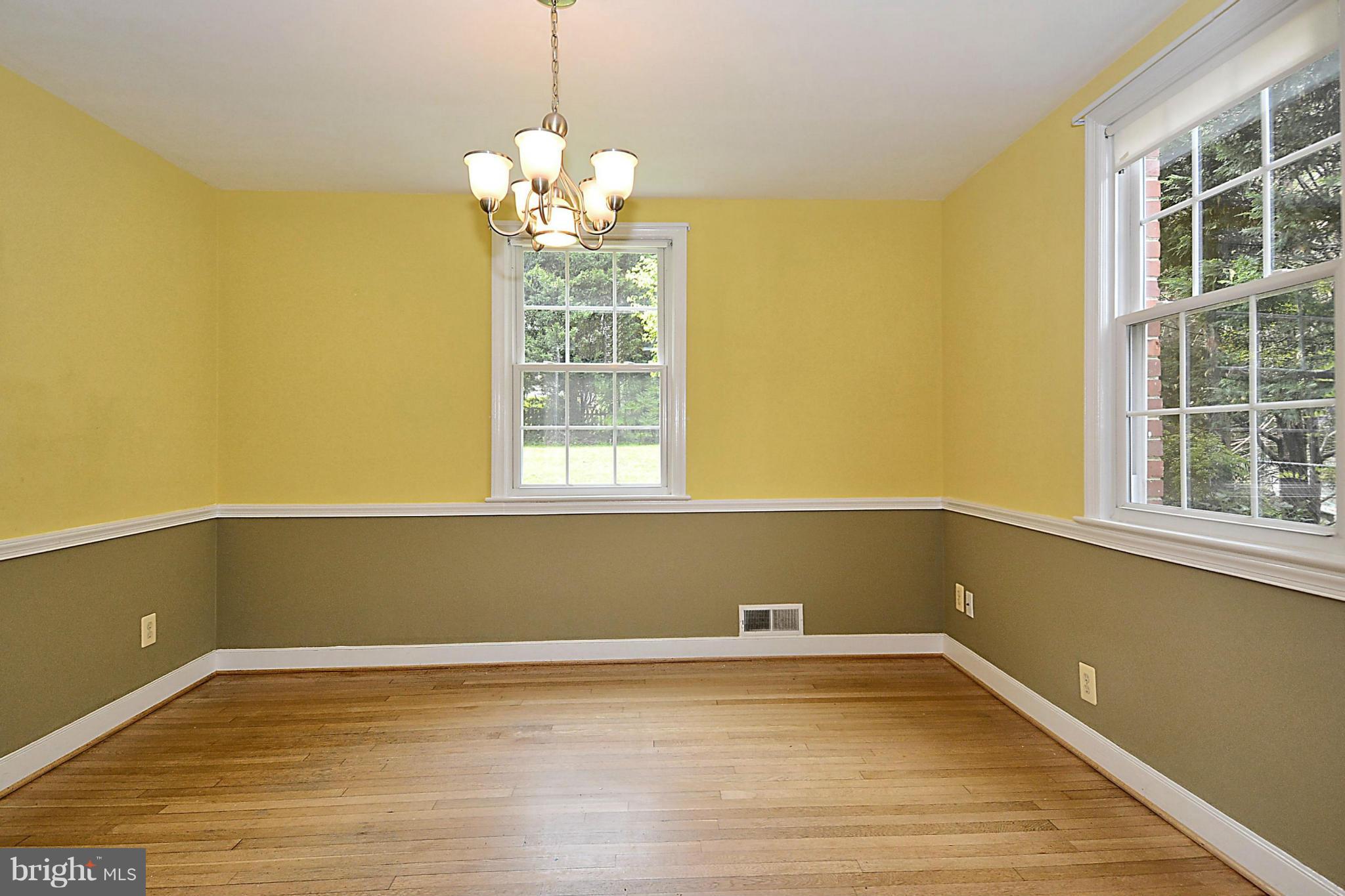 5004 Allan Road Bethesda, MD 20816 - Photo 8 of 30 a view of wooden floor and windows in a room