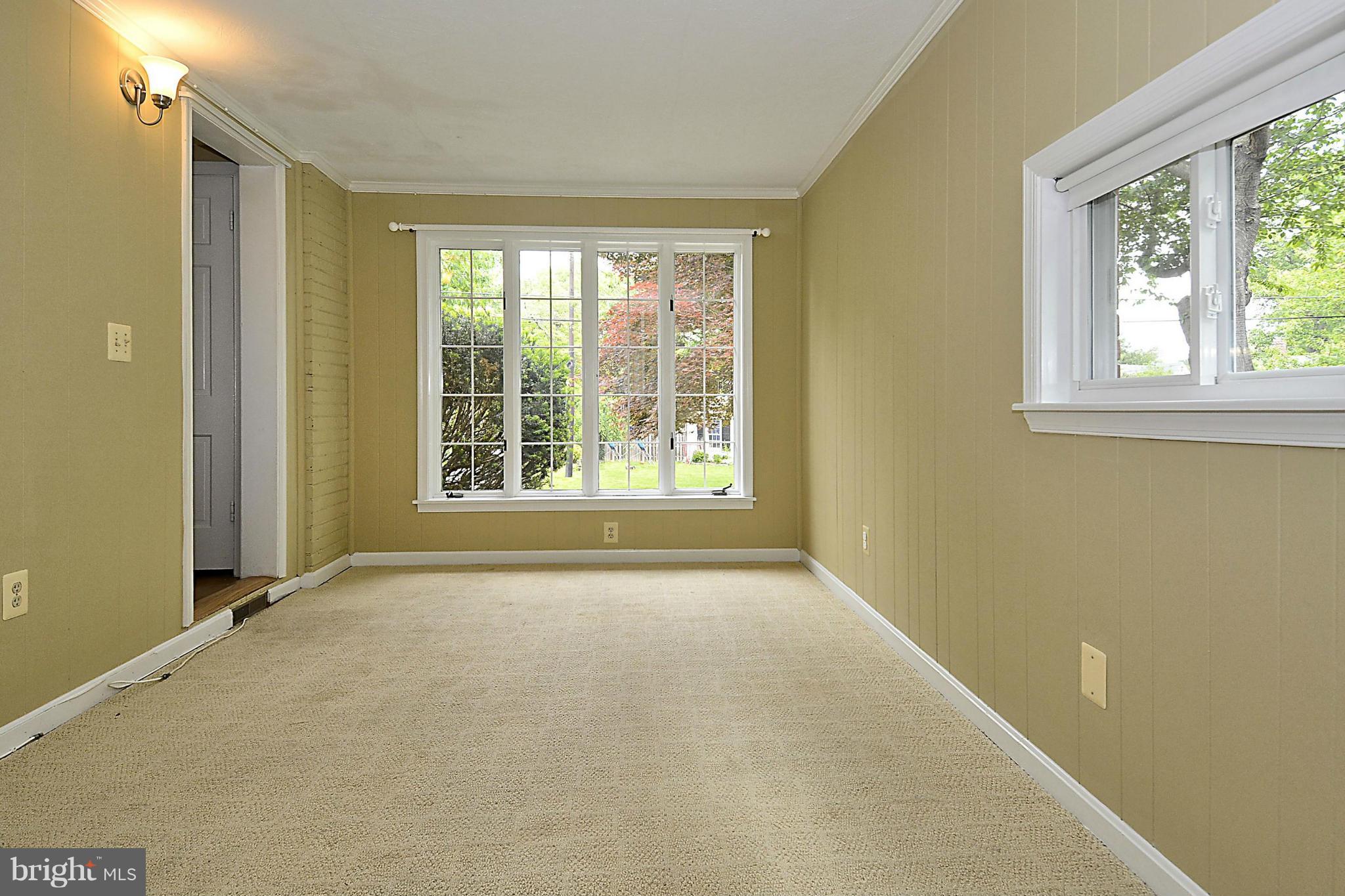 5004 Allan Road Bethesda, MD 20816 - Photo 9 of 30 a view of an empty room with a window