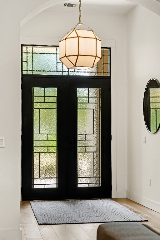 7909 Orisha Drive Austin, TX 78739 - Photo 2 of 40 a view of entryway with wooden floor