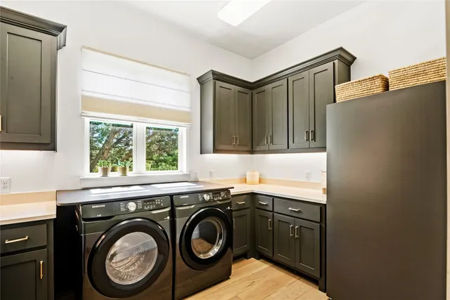 a outdoor living space with furniture and a flat screen tv