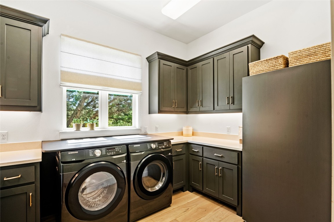 7909 Orisha Drive Austin, TX 78739 - Photo 25 of 40 a utility room with sink dryer and washer