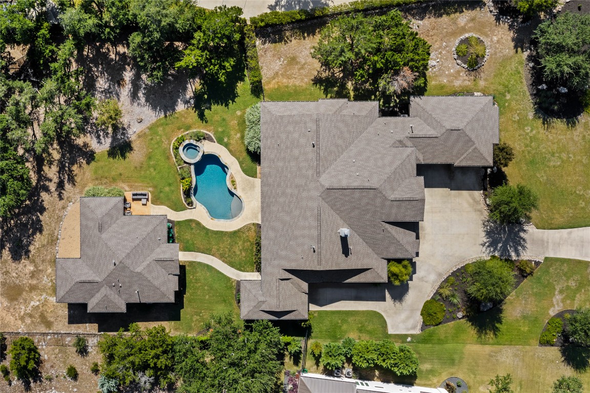 7909 Orisha Drive Austin, TX 78739 - Photo 37 of 40 an aerial view of residential house with outdoor space and swimming pool