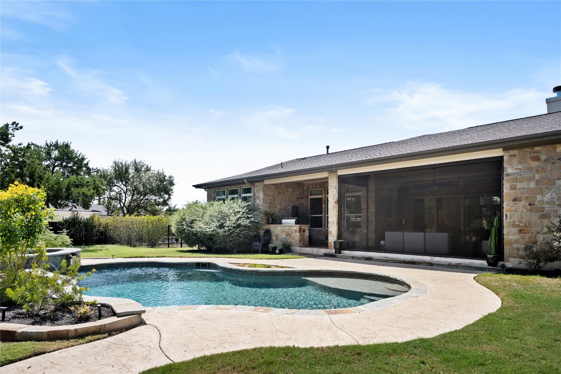 7909 Orisha Drive Austin, TX 78739 - Photo 38 of 40 a view of a house with yard and plants