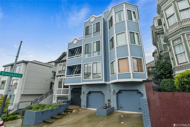 a front view of a building with balcony