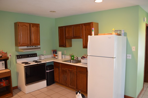 15 Bay Path Road Belchertown, MA 01007 - Photo 26 of 30 a white refrigerator freezer sitting in a kitchen