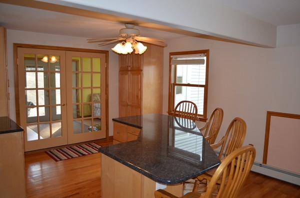 15 Bay Path Road Belchertown, MA 01007 - Photo 4 of 30 a view of a livingroom with furniture window and wooden floor