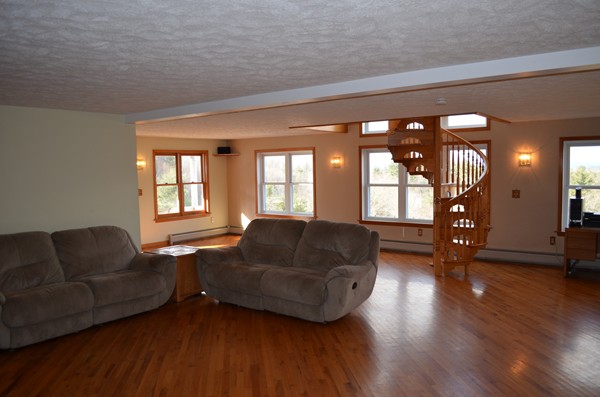 15 Bay Path Road Belchertown, MA 01007 - Photo 6 of 30 a living room with furniture and wooden floor