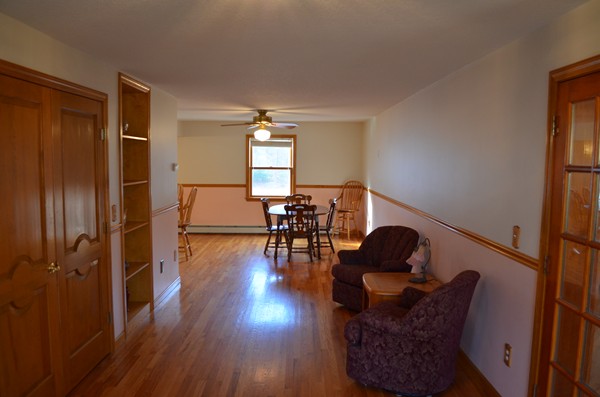 15 Bay Path Road Belchertown, MA 01007 - Photo 7 of 30 a living room with furniture and a wooden floor