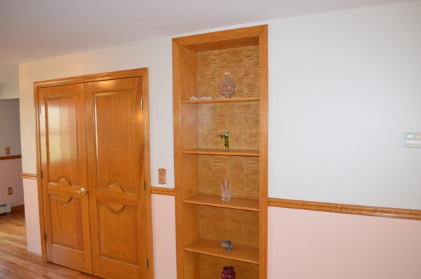 15 Bay Path Road Belchertown, MA 01007 - Photo 8 of 30 a view of an empty room with wooden floor and a window