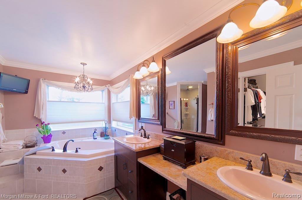 3595 Jossman Road Holly, MI 48442 - Photo 18 of 49 Master suite w/dual vanities & jetted tub