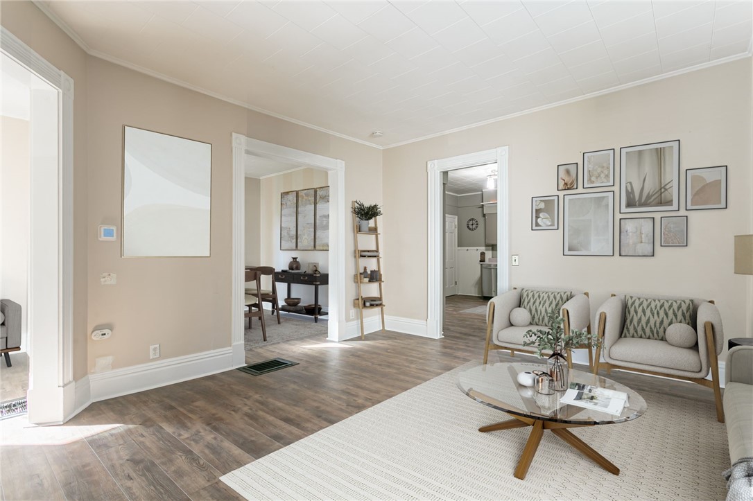 716 Linden Street Rochester, NY 14620 - Photo 3 of 34 Virtually Staged living, sitting and dining areas.