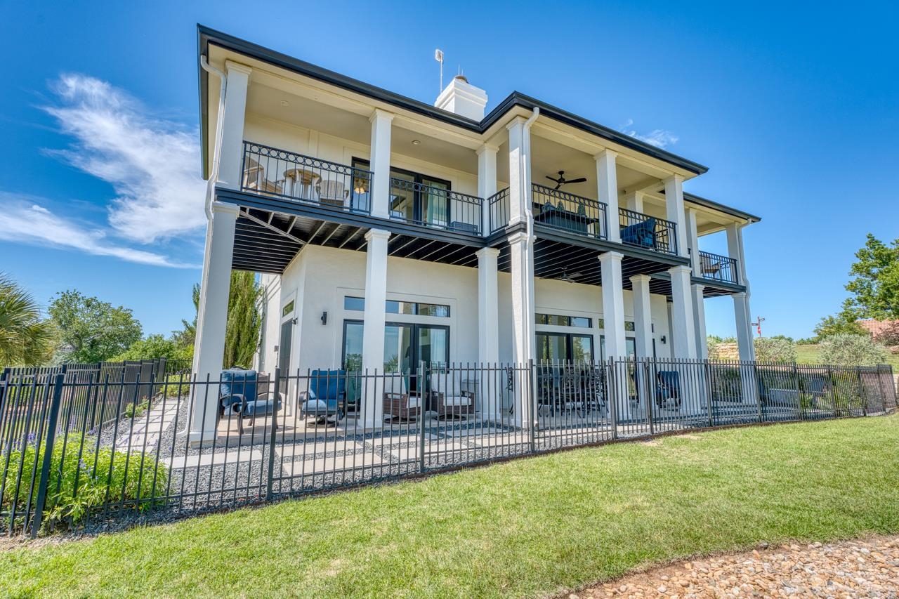 3305 Close Call Horseshoe Bay, TX 78657 - Photo 1 of 30 a front view of a house with a garden