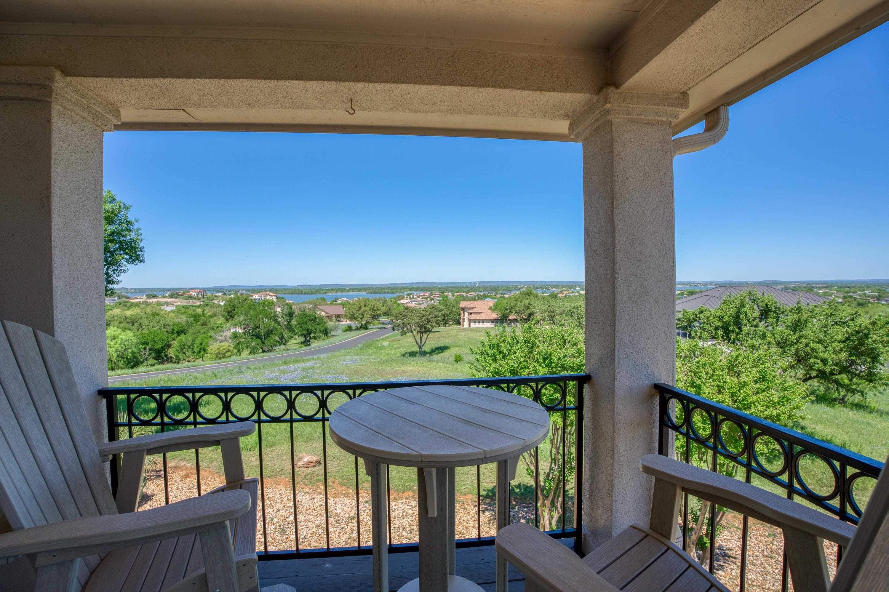 3305 Close Call Horseshoe Bay, TX 78657 - Photo 11 of 30 a view of a chair and table in the balcony