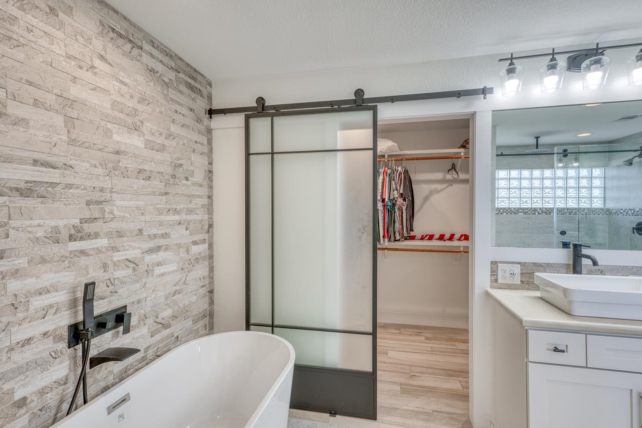 3305 Close Call Horseshoe Bay, TX 78657 - Photo 16 of 30 a bathroom with a sink and a mirror