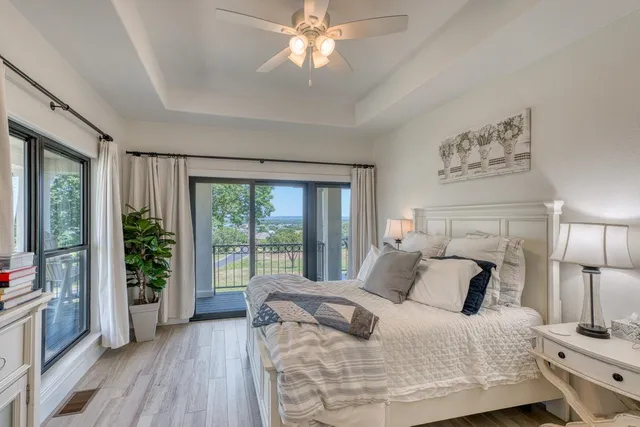 a view of a room that has a large window