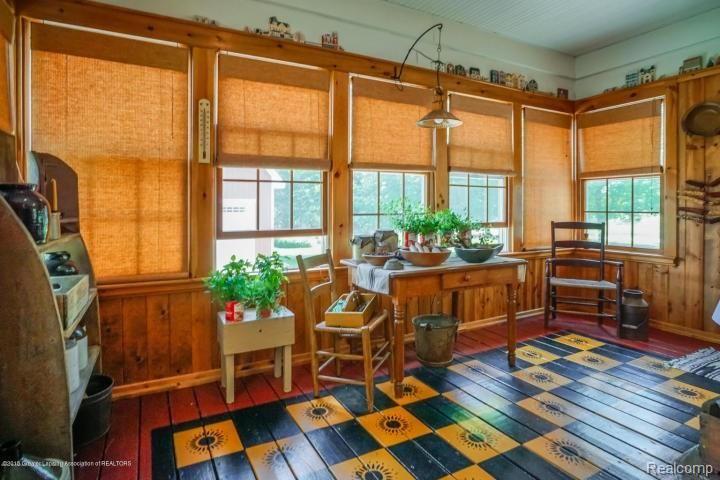 5301 Sherwood Road Webberville, MI 48892 - Photo 7 of 30 Stenciled floor in the enclosed porch.