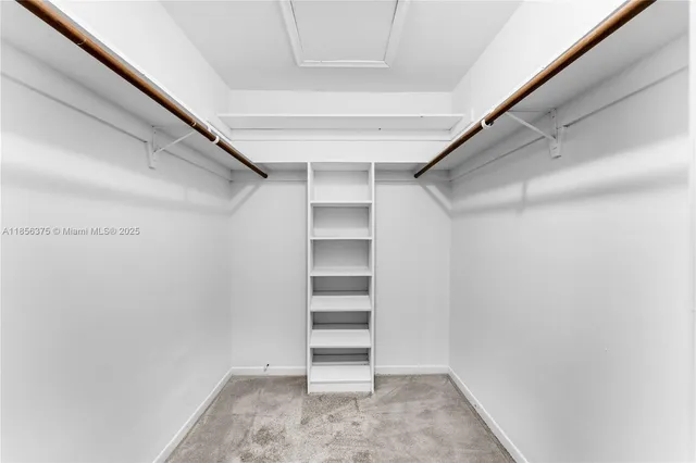 a view of an empty walk in closet