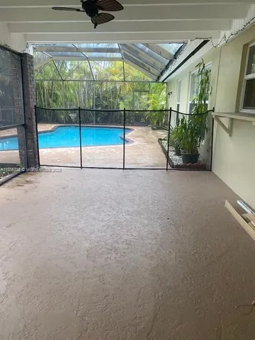 a view of an empty room with a sliding door