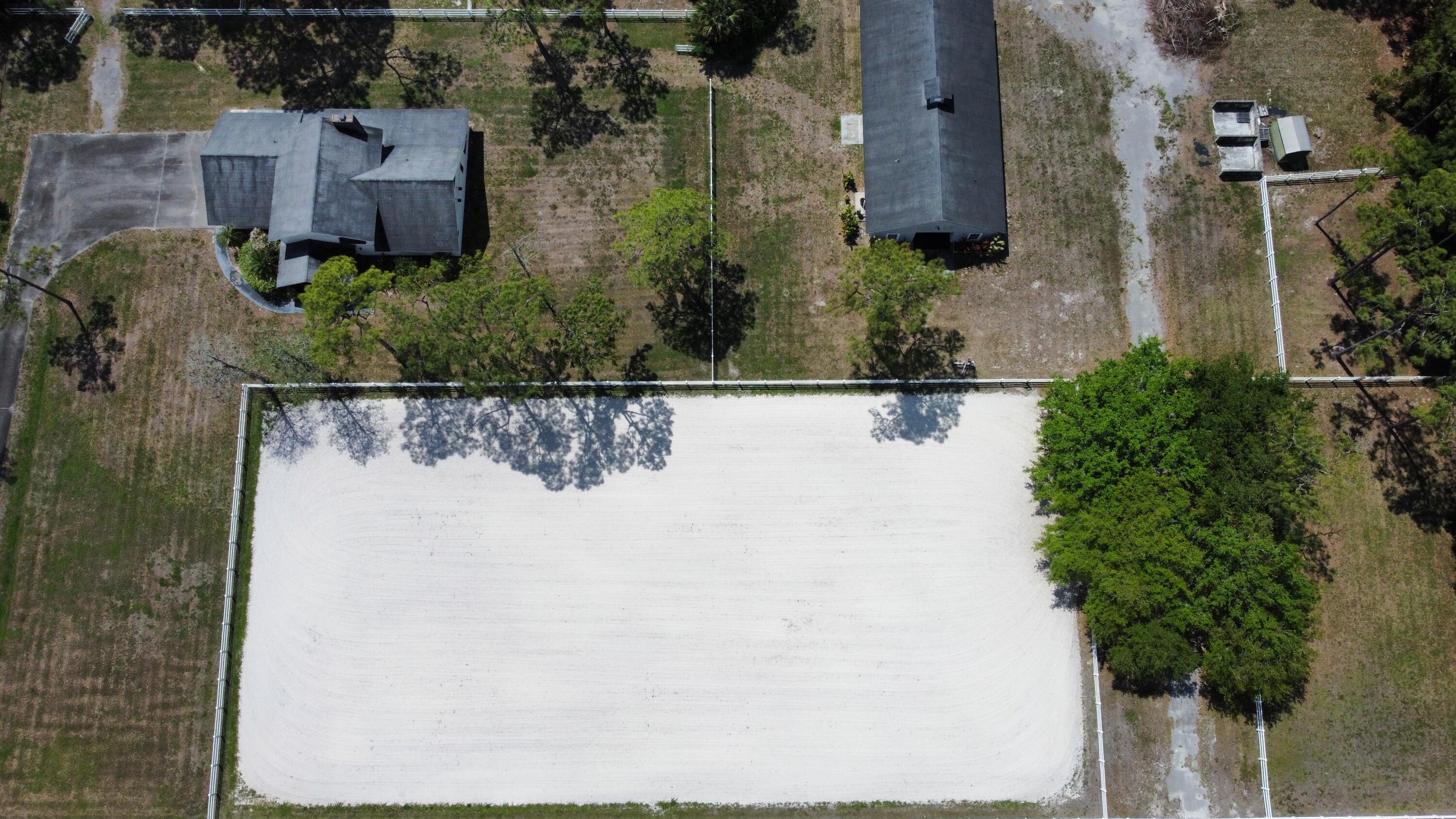 13346 Casey Road Loxahatchee Groves, FL 33470 - Photo 3 of 41 dji_fly_20260327_122412_621_177462922245