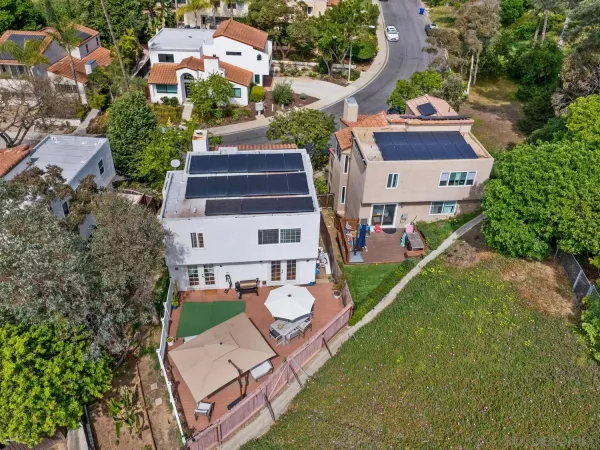 an aerial view of a house with a garden