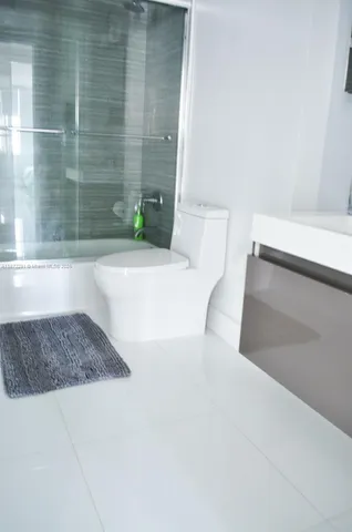 a view of a city with tall buildings in ocean