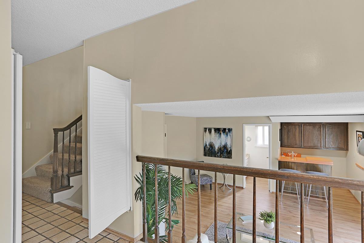 773 Crestview Drive Millbrae, CA 94030 - Photo 15 of 40 a view of a hallway with windows