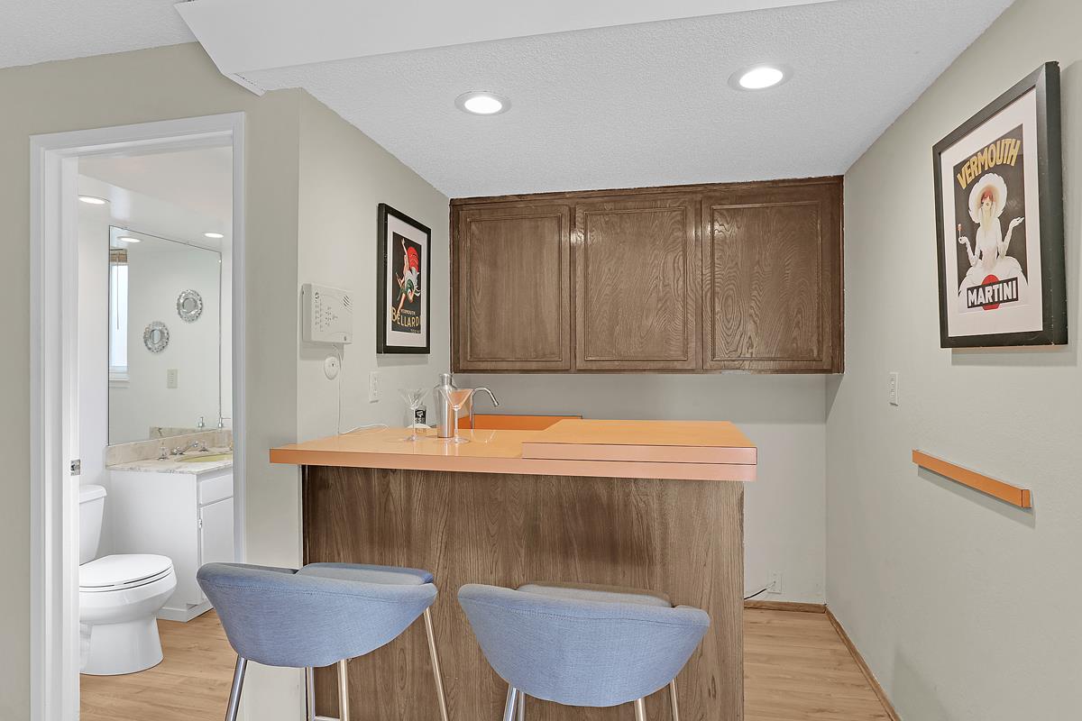 773 Crestview Drive Millbrae, CA 94030 - Photo 17 of 40 a hallway with a table and chairs