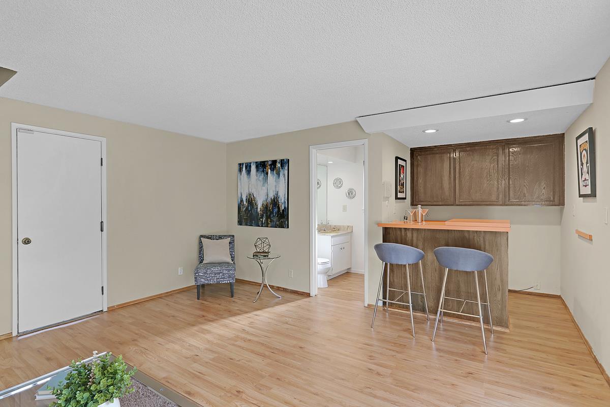 773 Crestview Drive Millbrae, CA 94030 - Photo 18 of 40 a view of a livingroom with furniture and wooden floor