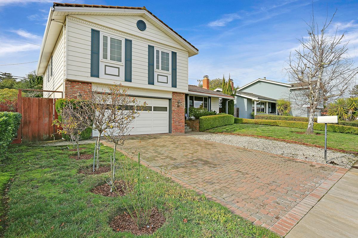 773 Crestview Drive Millbrae, CA 94030 - Photo 2 of 40 a front view of a house with a yard