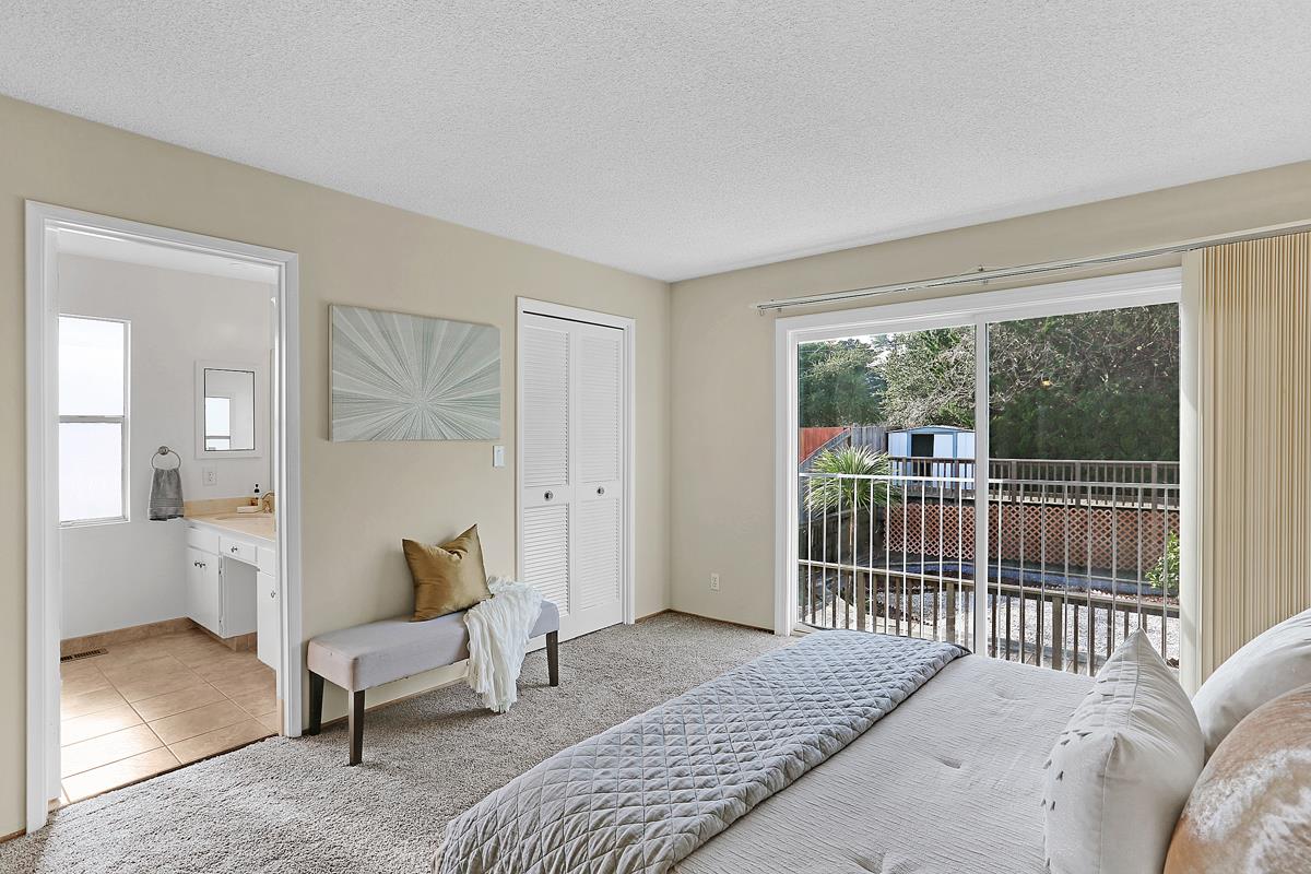 773 Crestview Drive Millbrae, CA 94030 - Photo 21 of 40 a bedroom with a bed and a view of bathroom