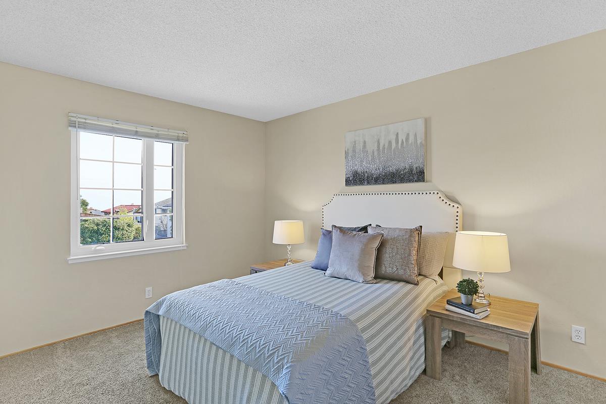 773 Crestview Drive Millbrae, CA 94030 - Photo 25 of 40 a bedroom with bed and window
