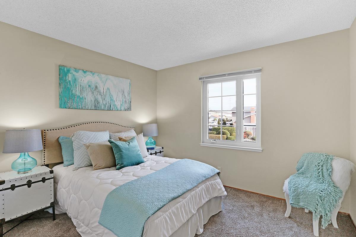 773 Crestview Drive Millbrae, CA 94030 - Photo 27 of 40 a bedroom with a bed and window