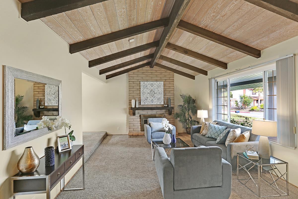 773 Crestview Drive Millbrae, CA 94030 - Photo 5 of 40 a living room with furniture and a flat screen tv