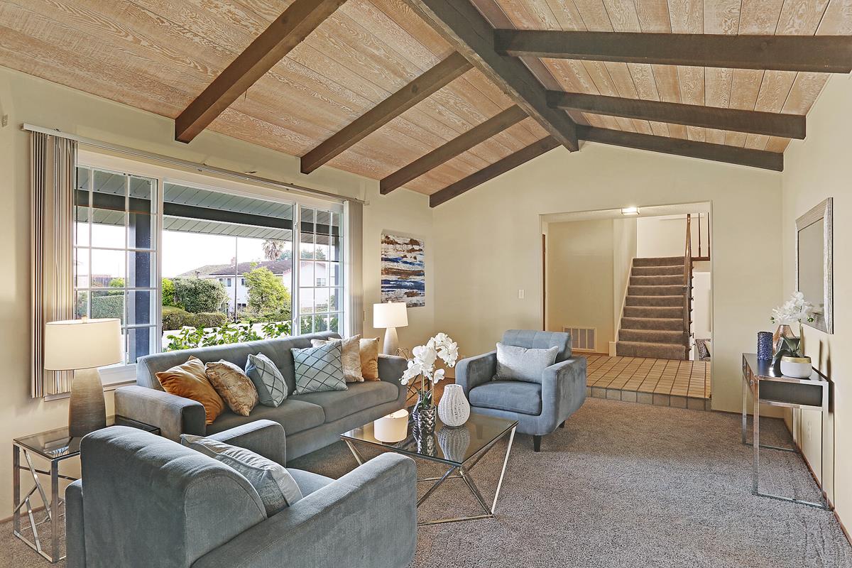 773 Crestview Drive Millbrae, CA 94030 - Photo 6 of 40 a living room with furniture and a large window