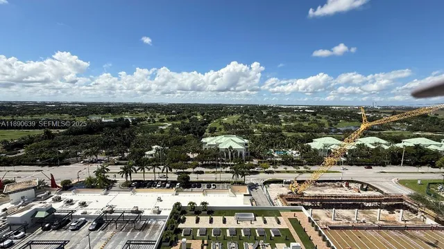 a dining room with a table and chairs