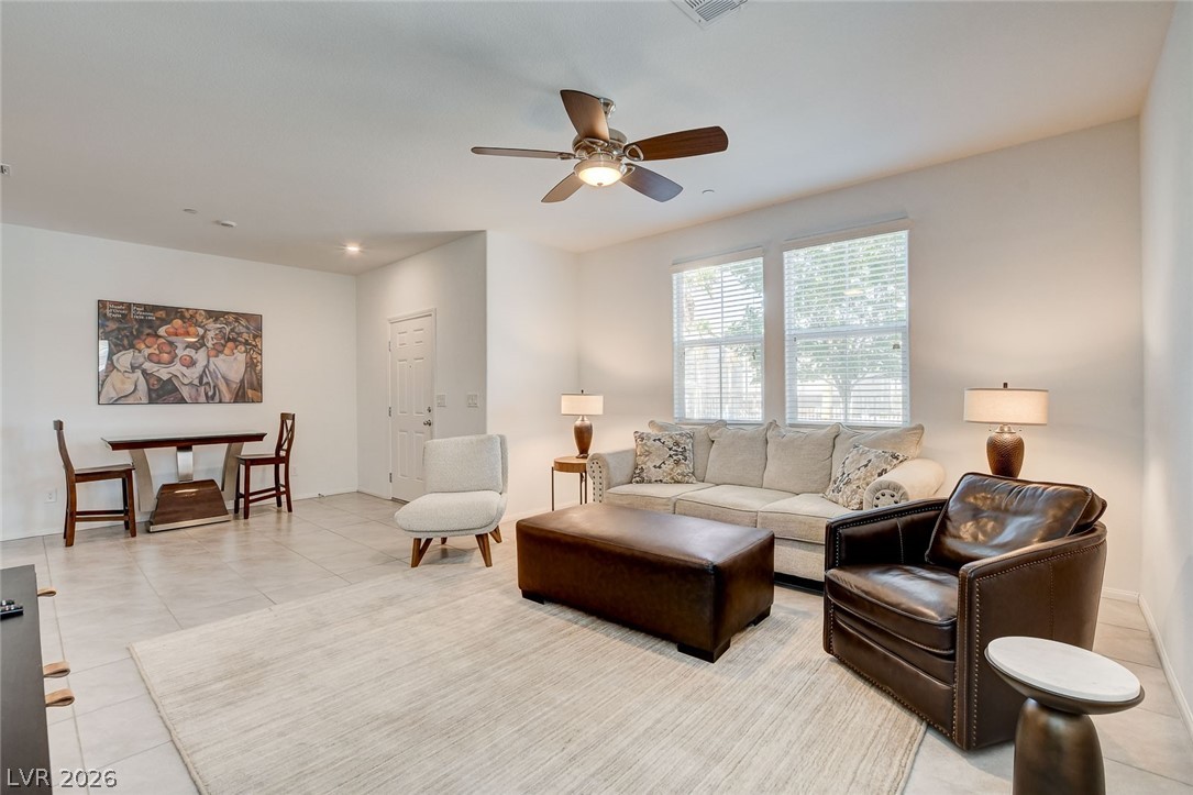 484 Filaree Place Henderson, NV 89015 - Photo 13 of 71 This bright living space features recessed lighting and ample natural light, creating an inviting atmosphere.