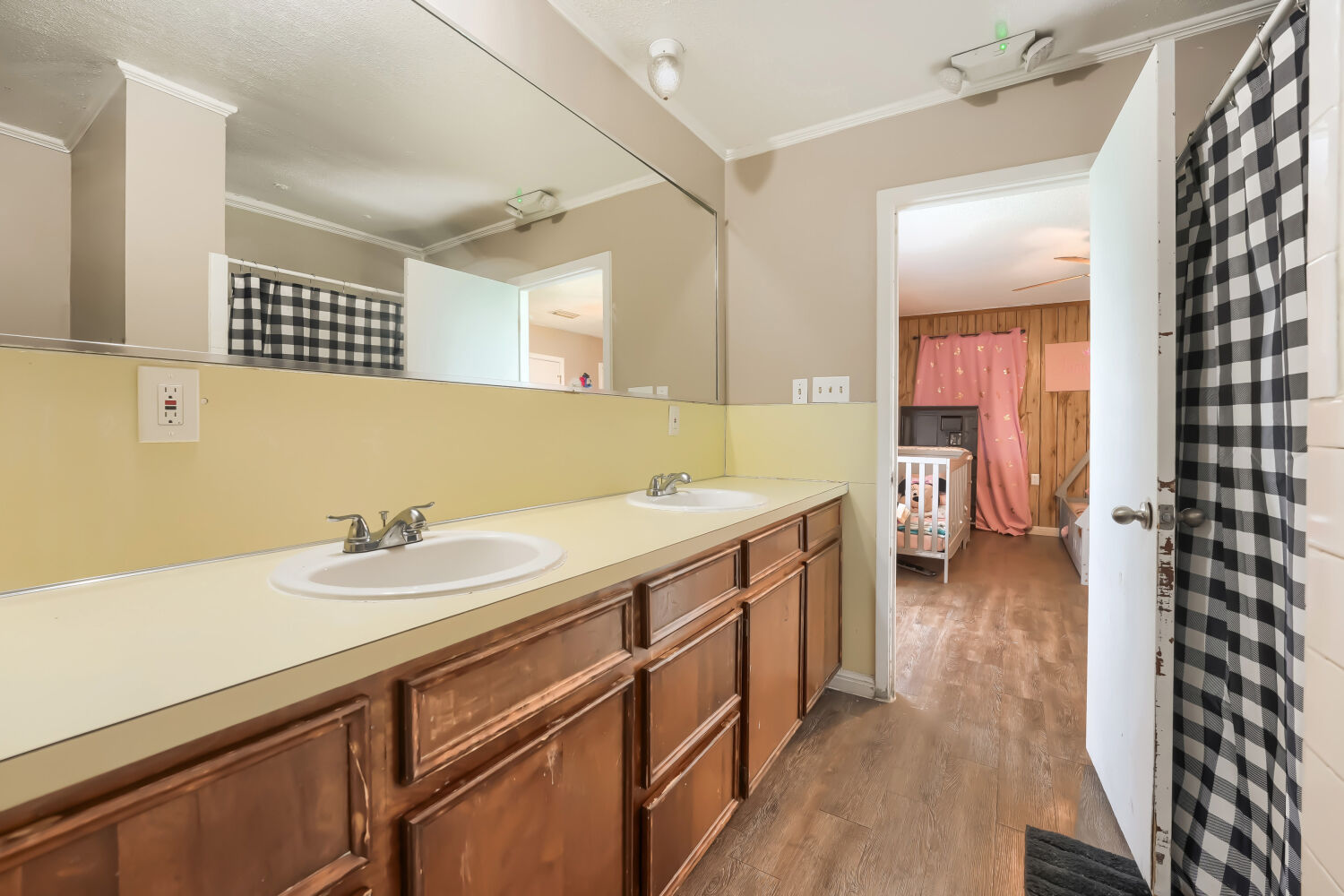 14520 Bois-D-Arc Road Manor, TX 78653 - Photo 9 of 21 a bathroom with a sink and a mirror