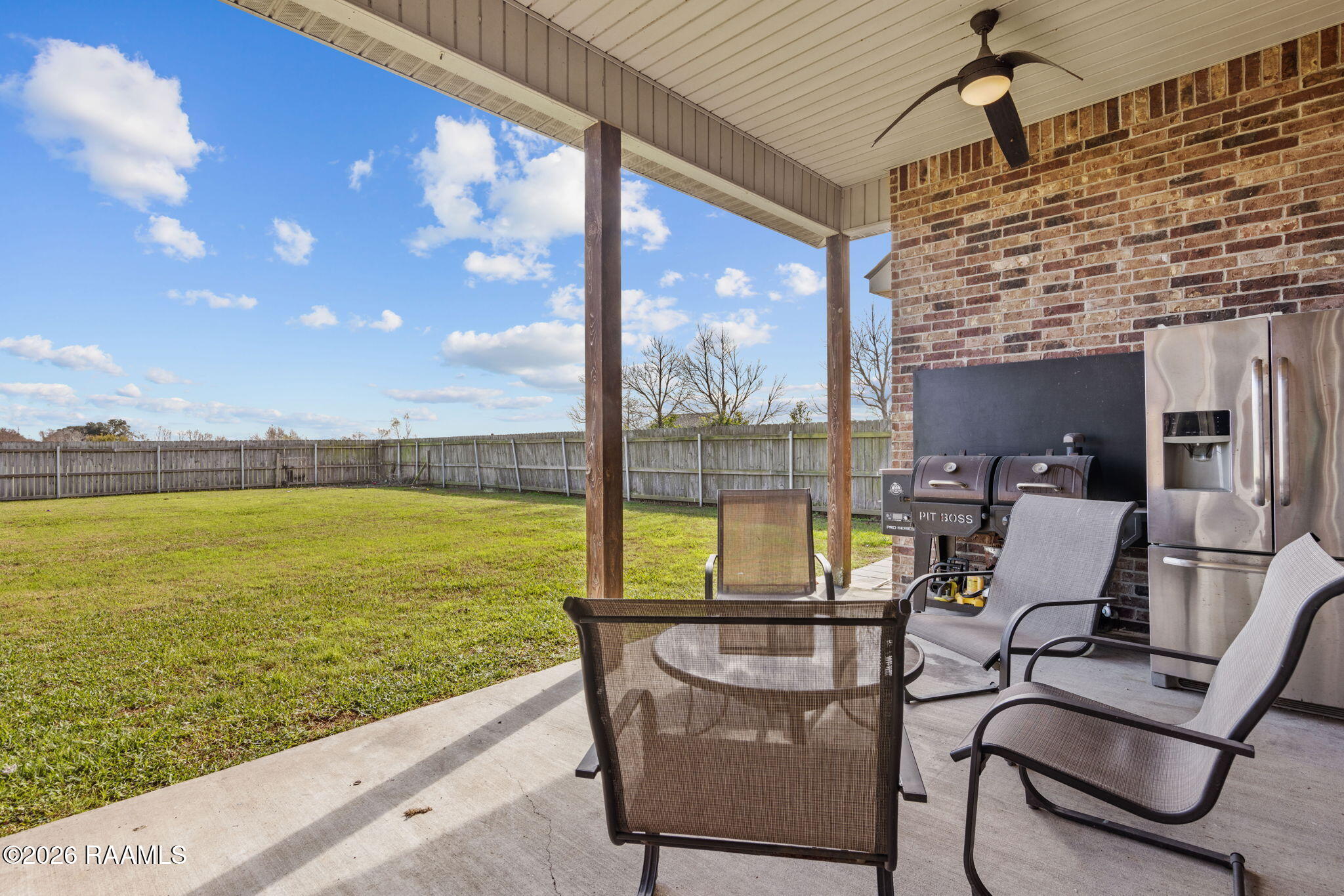 101 Chemet Road Youngsville, LA 70592 - Photo 25 of 29 Large covered rear patio