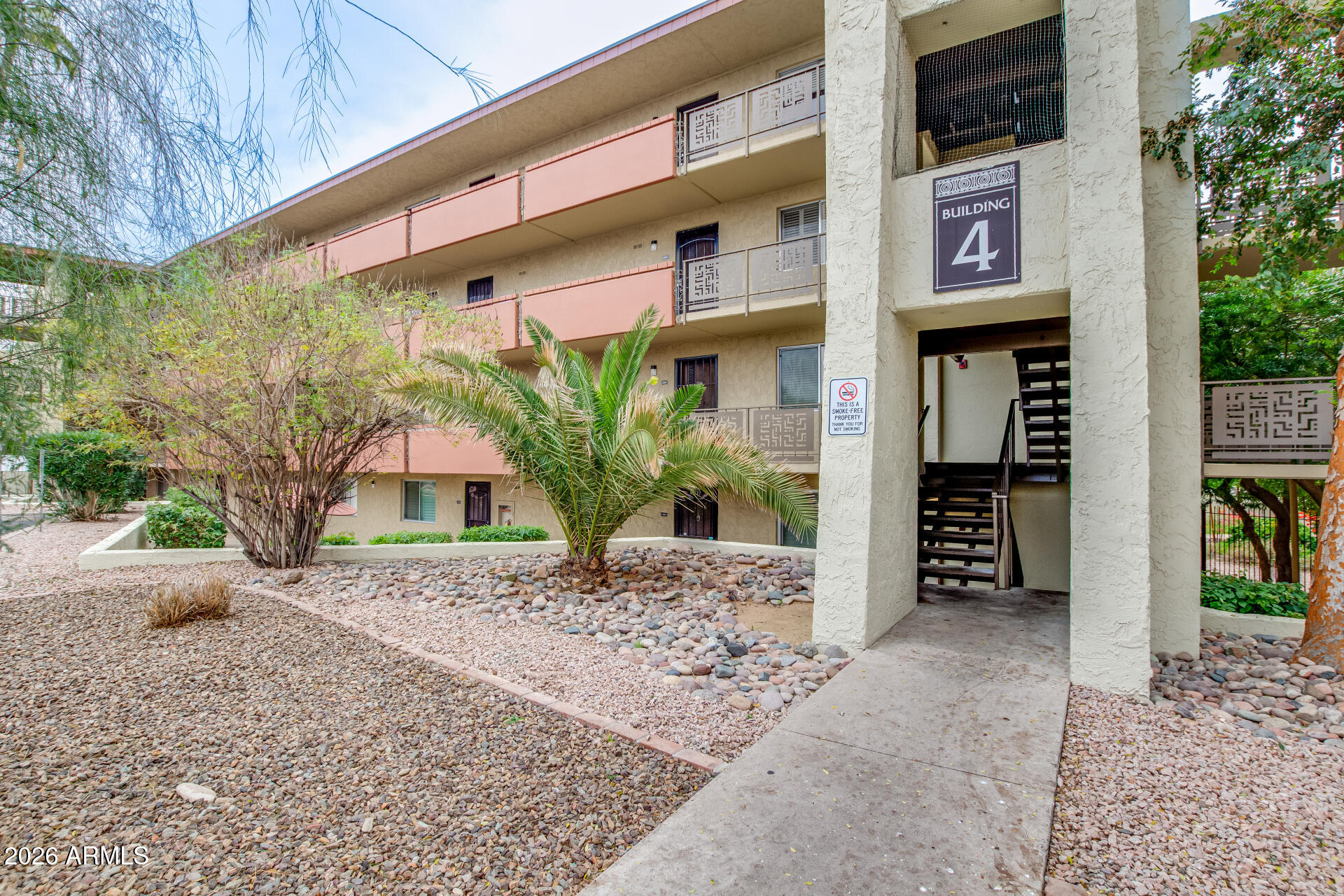 7625 East Camelback Road, Unit A220 Scottsdale, AZ 85251 - Photo 14 of 37 a view of a potted plants in front of a building