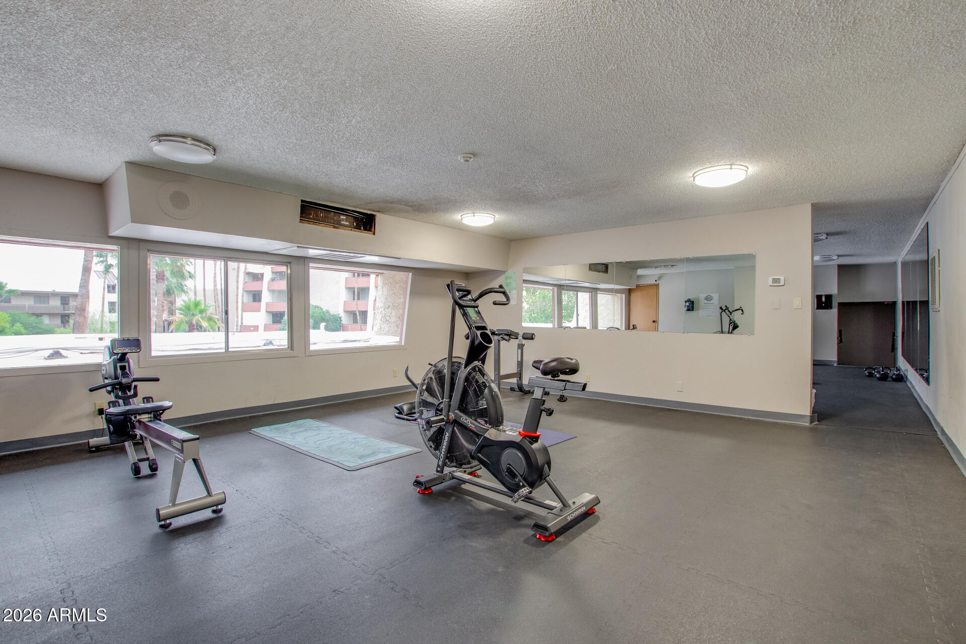 7625 East Camelback Road, Unit A220 Scottsdale, AZ 85251 - Photo 33 of 37 a view of a room with gym equipment
