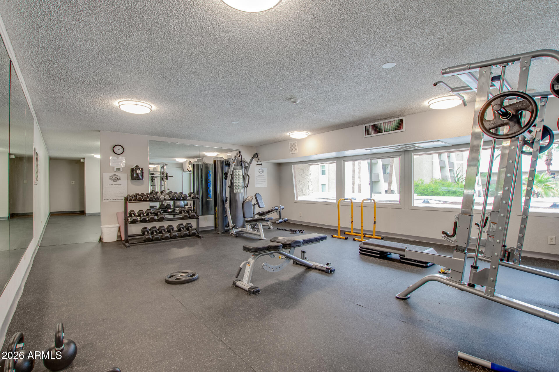 7625 East Camelback Road, Unit A220 Scottsdale, AZ 85251 - Photo 34 of 37 a view of a room with gym equipment