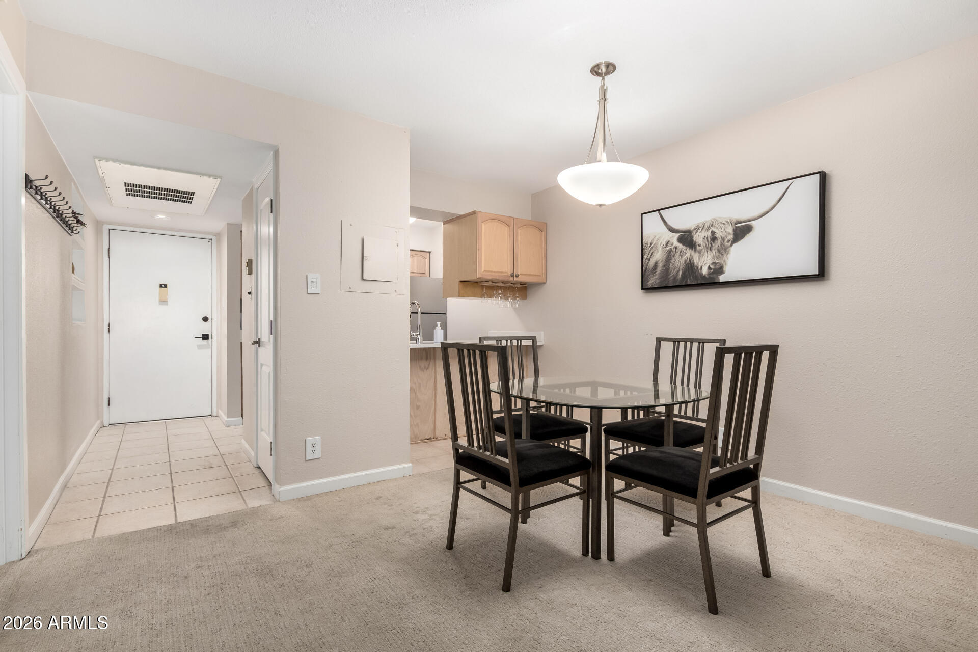 7625 East Camelback Road, Unit A220 Scottsdale, AZ 85251 - Photo 3 of 37 a view of a dining room with furniture