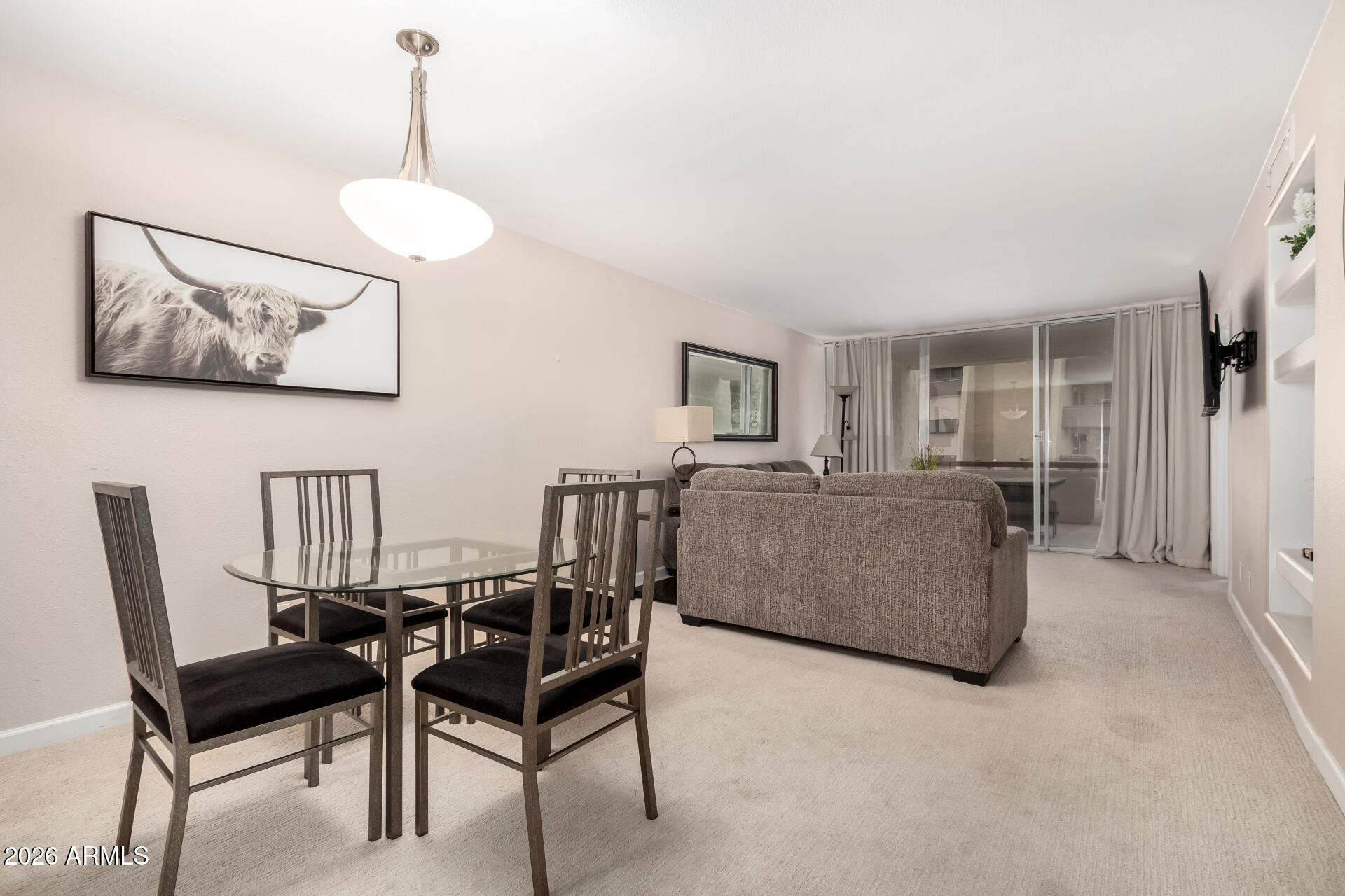 7625 East Camelback Road, Unit A220 Scottsdale, AZ 85251 - Photo 5 of 37 a dining room with furniture and window